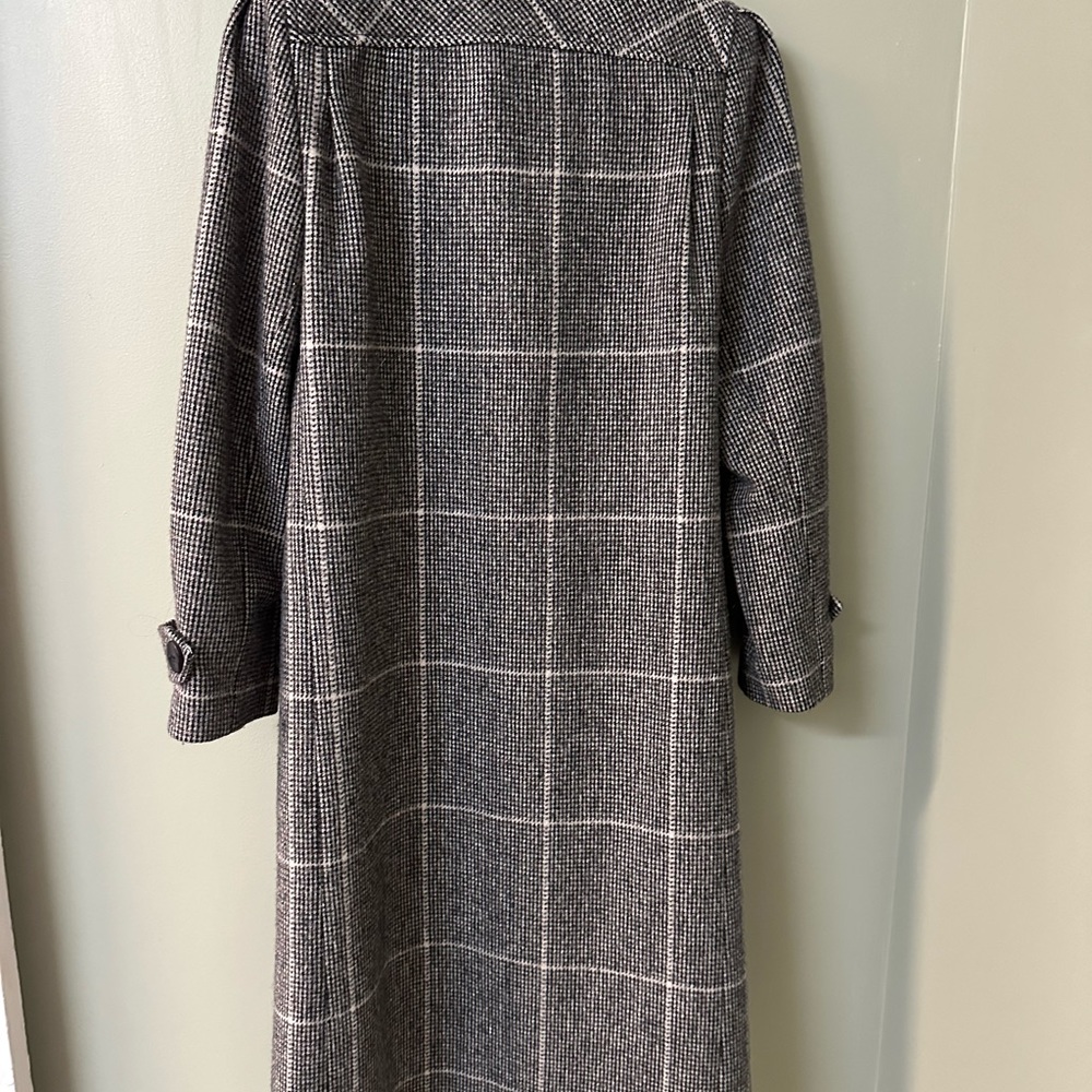 Excellent condition, lightly worn and well cared for. No holes or stains.